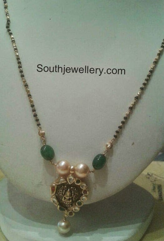 Black Beads Chain with Lakshmi Pendant Jewellery Designs