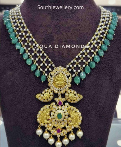 Pearl and emerald beads necklace with Lakshmi pendant