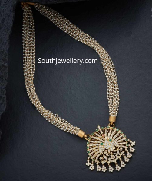 pearl necklace with peacock pendant
