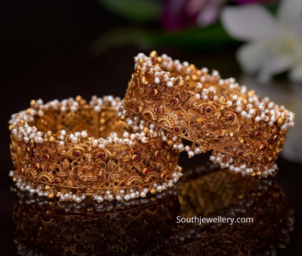 broad gold bangle designs by pmj jewels