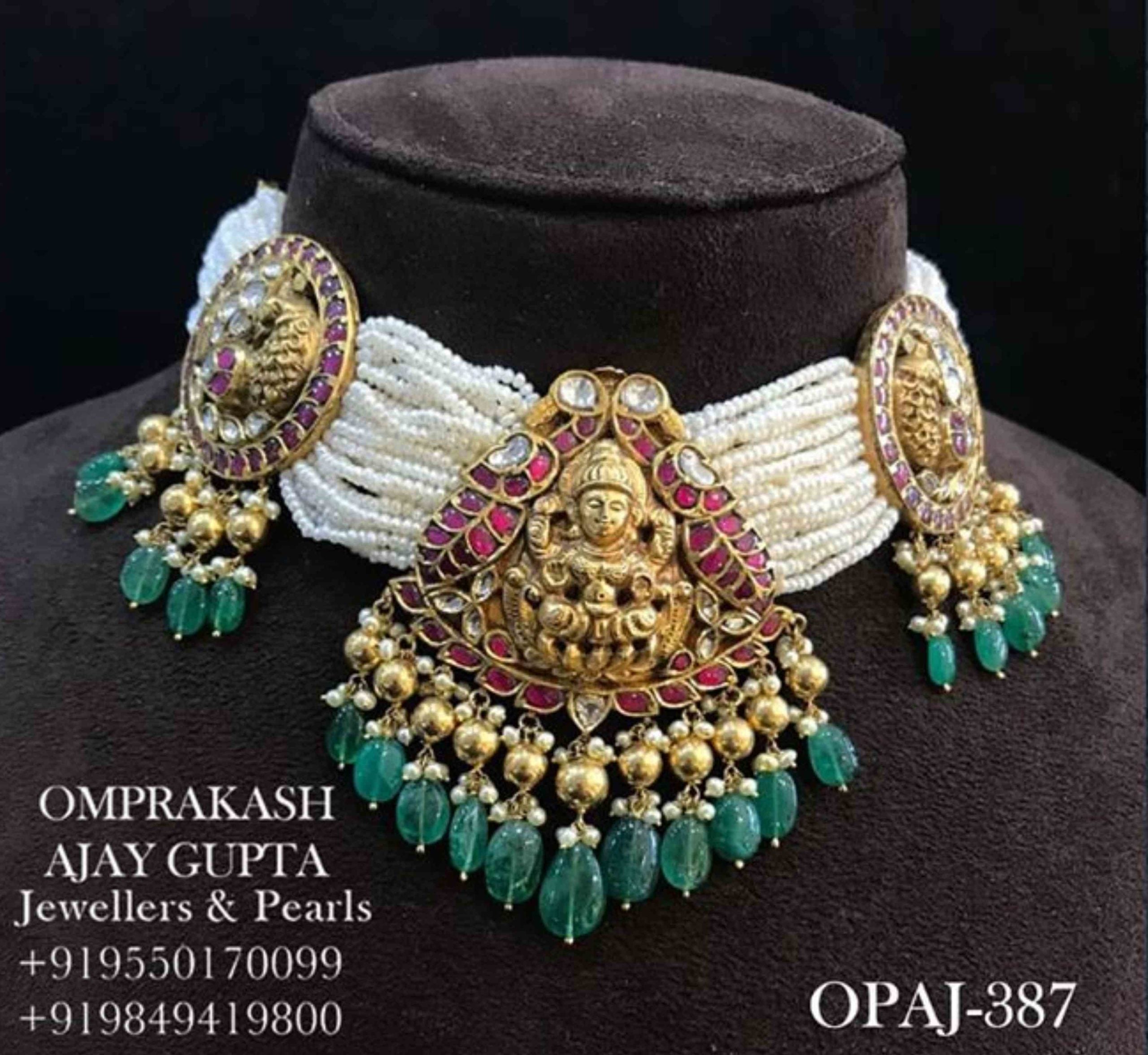 Multi strand pearl choker with Lakshmi pendant Indian Jewellery Designs