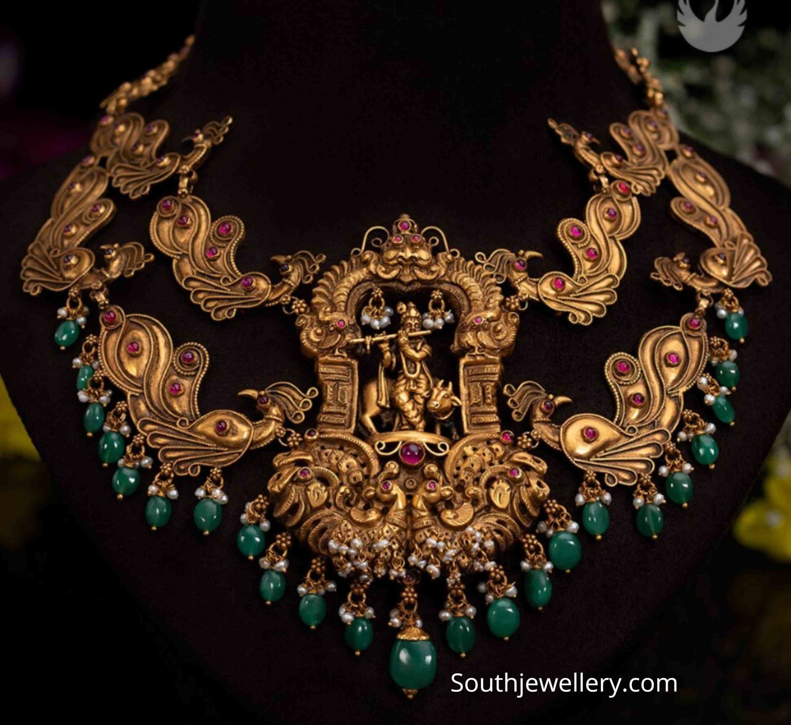 Antique gold two step peacock necklace with Lord Krishna pendant