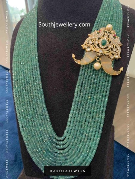 multi strand emerald beads mala with puligoru pendant