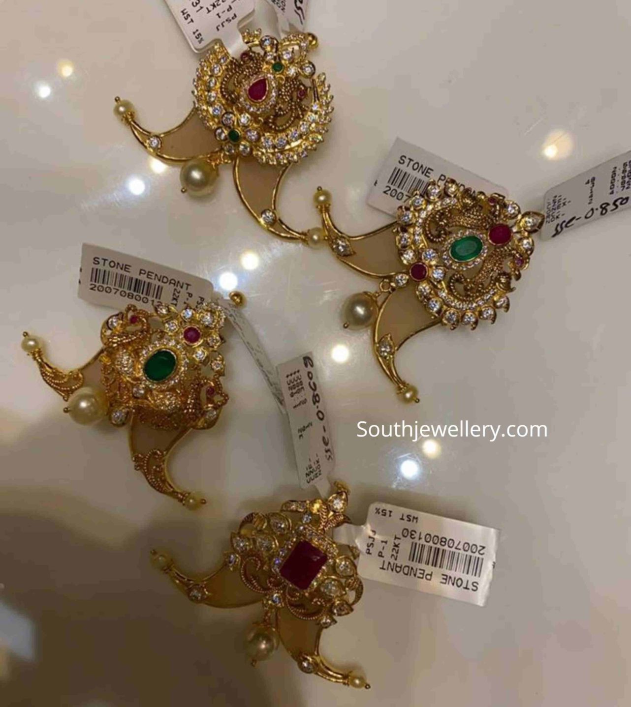 VHV Jewellers Inc. - The Twin Tiger Nail Pendant In South Indian jewellery,  the tiger's nail has traditionally evolved from a long-standing history  that dates back to the late 1800s during periods