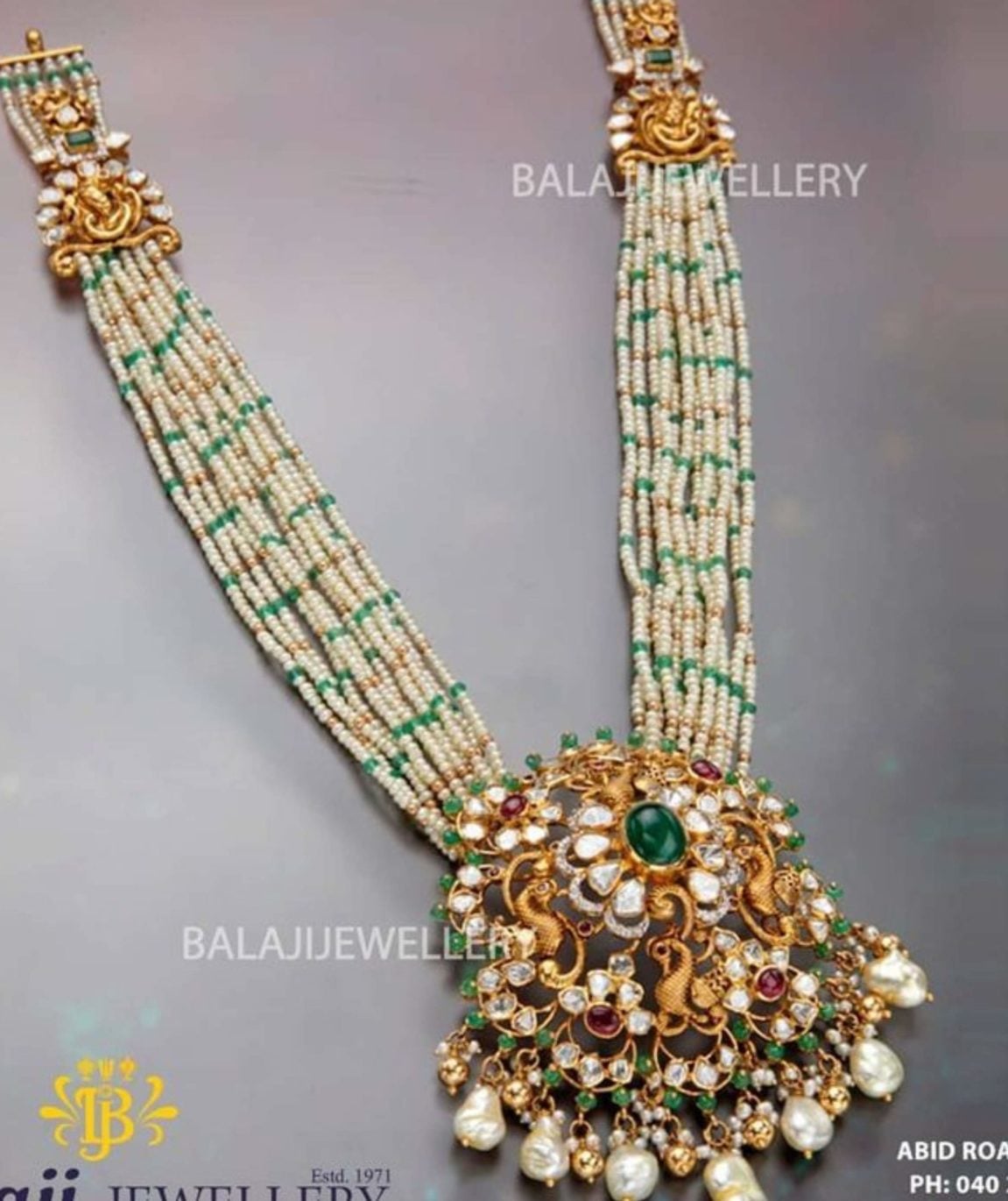Pearl haram with flat diamond peacock 