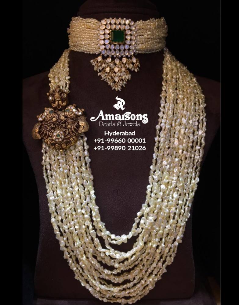 Long multi strand pearl necklace sale