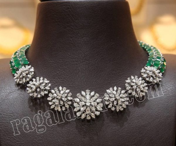 simple diamond and emerald necklace