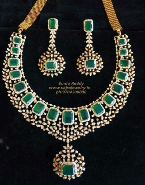 diamond and emerald necklace and earrings set