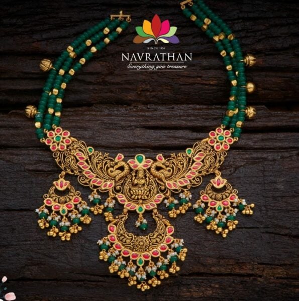 Emerald beads necklace with Lakshmi and peacock nakshi pendant