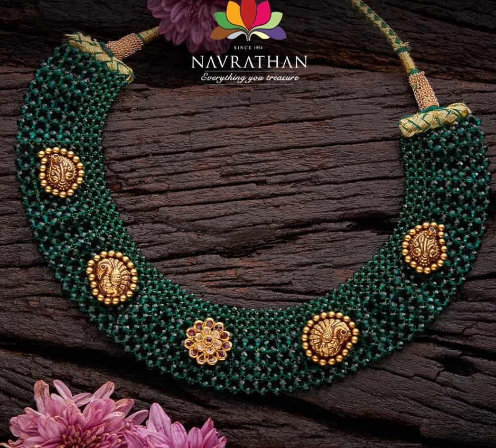Emerald beads necklace with gold motifs Indian Jewellery Designs
