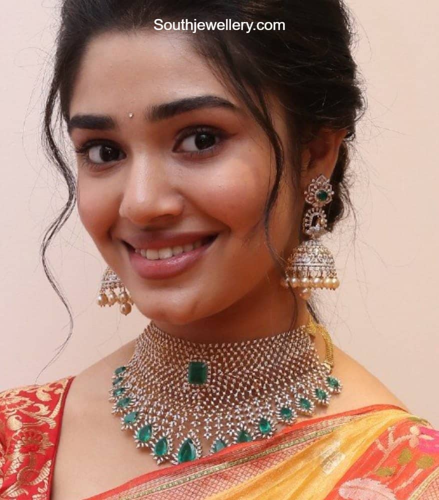 Krithi Shetty in diamond emerald choker and jhumkas set