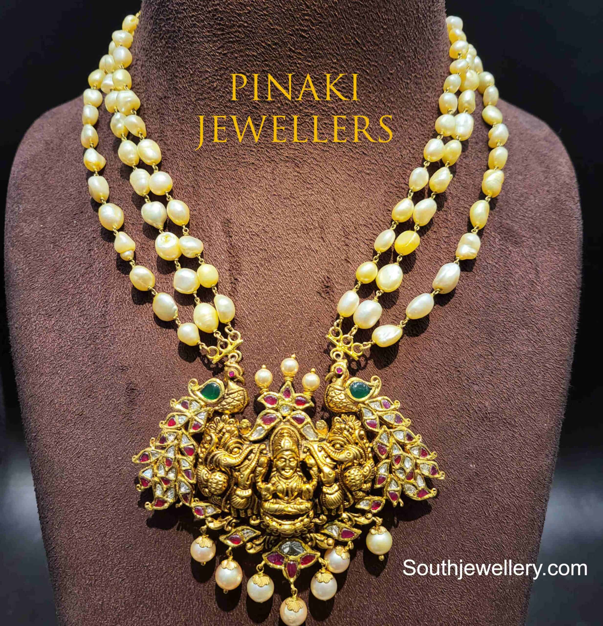 Pearl necklace with Lakshmi pendant Indian Jewellery Designs