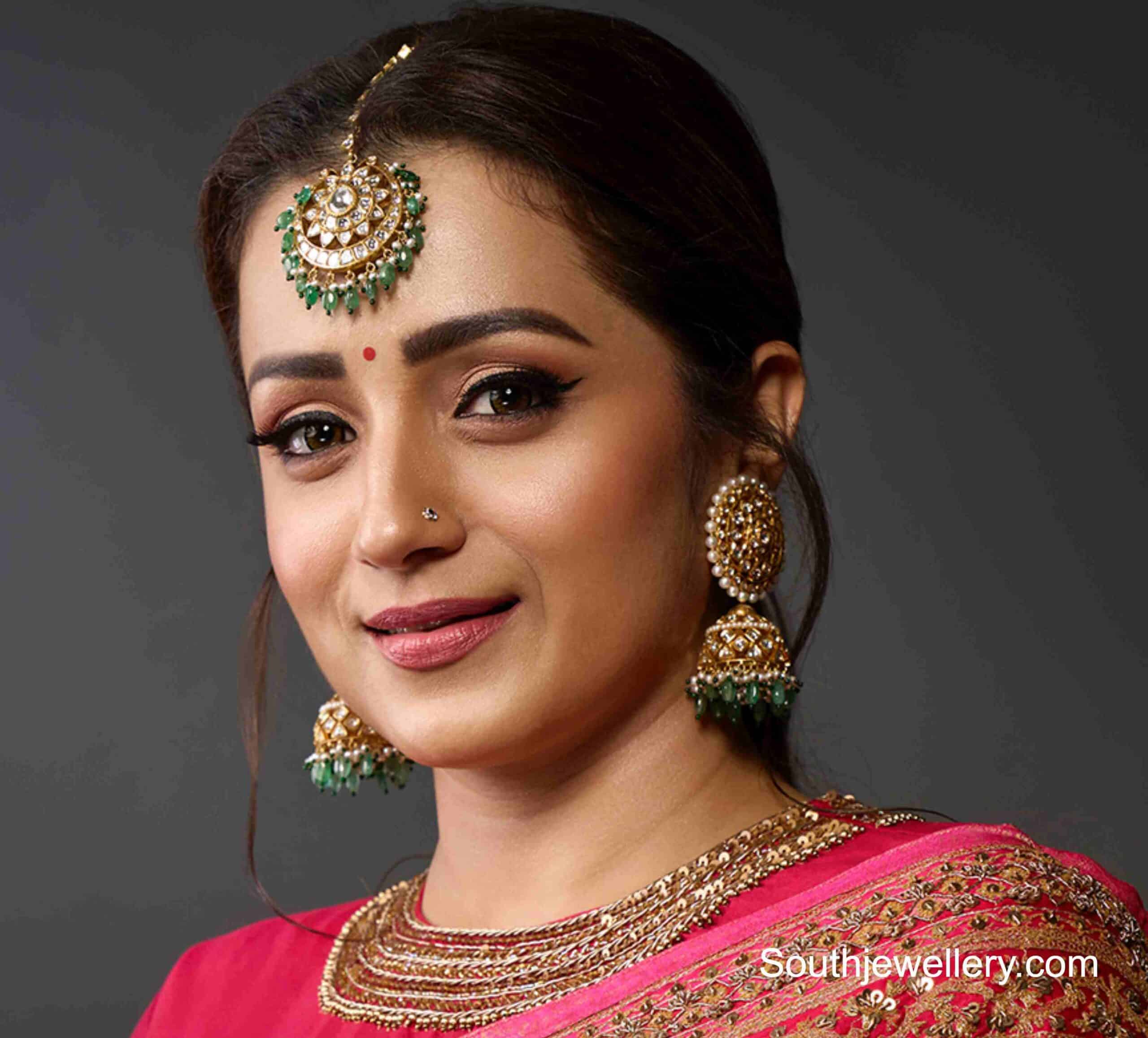 Trisha Krishnan in polki jhumkas and